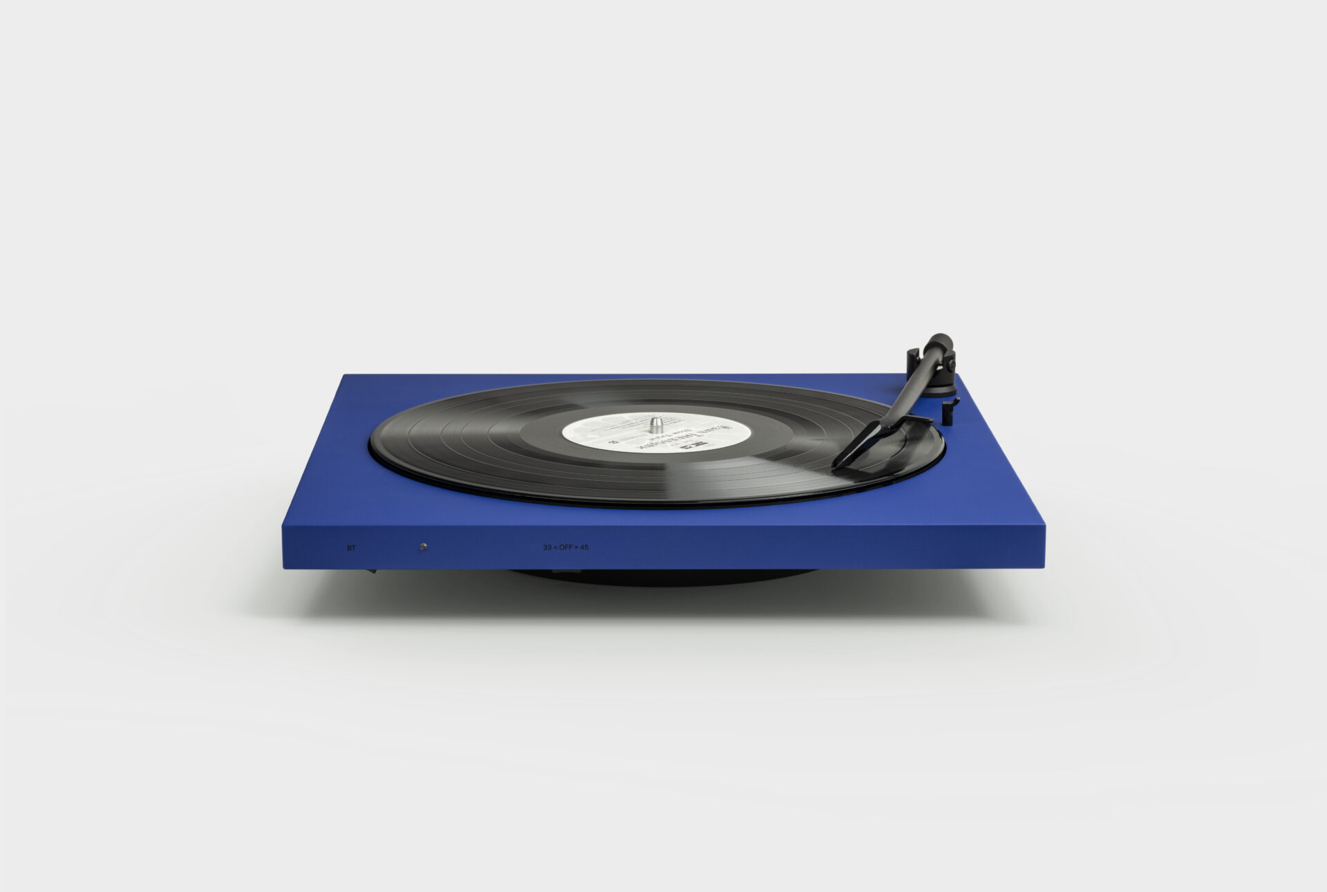 Ultramarine blue colored TONE record player displayed from the frontside