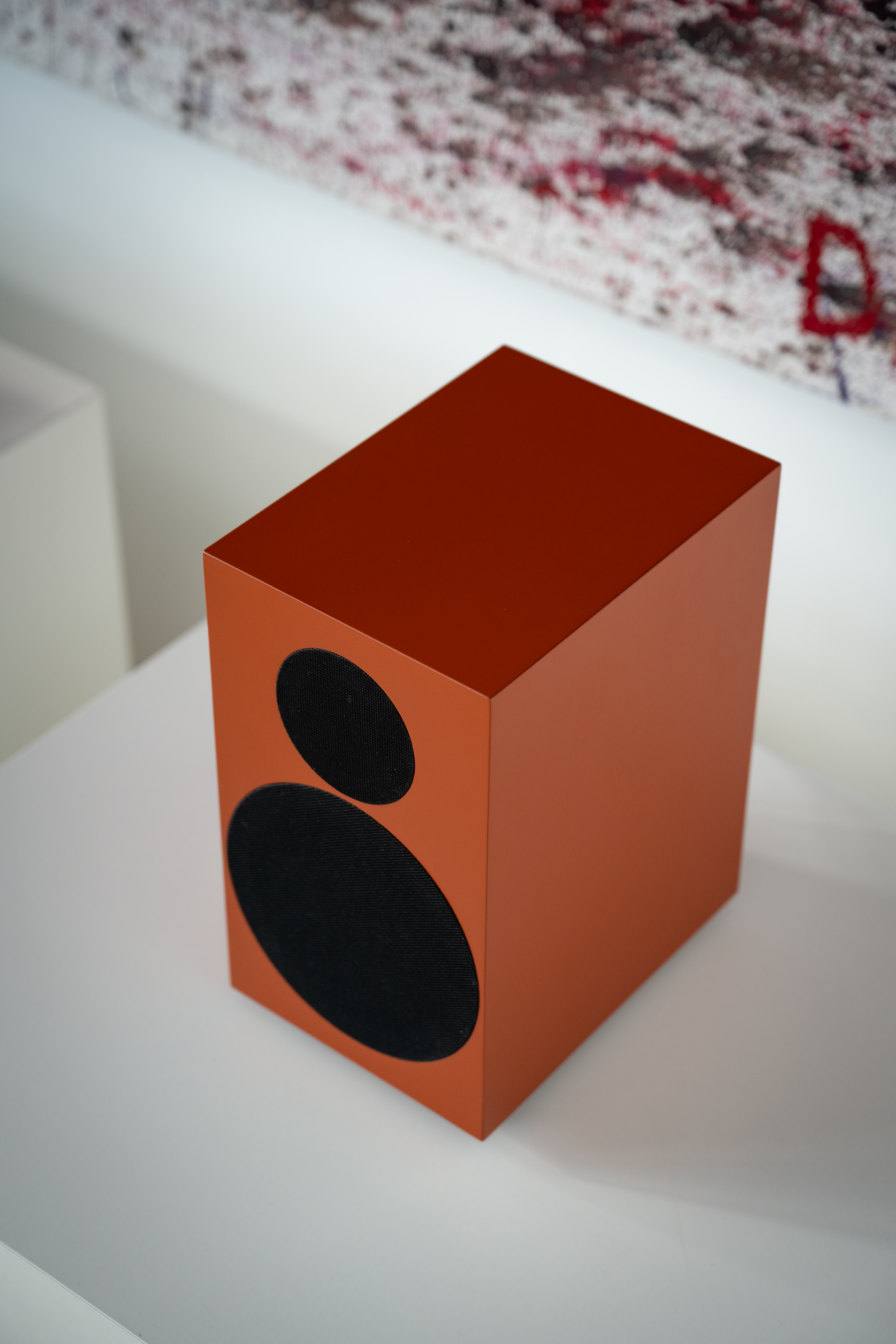 TONE Speaker S in terracotte red close up on a white shelf